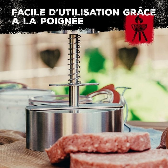 FM Professional hamburgerprés használat közben, könnyű kezelés a fogantyúval