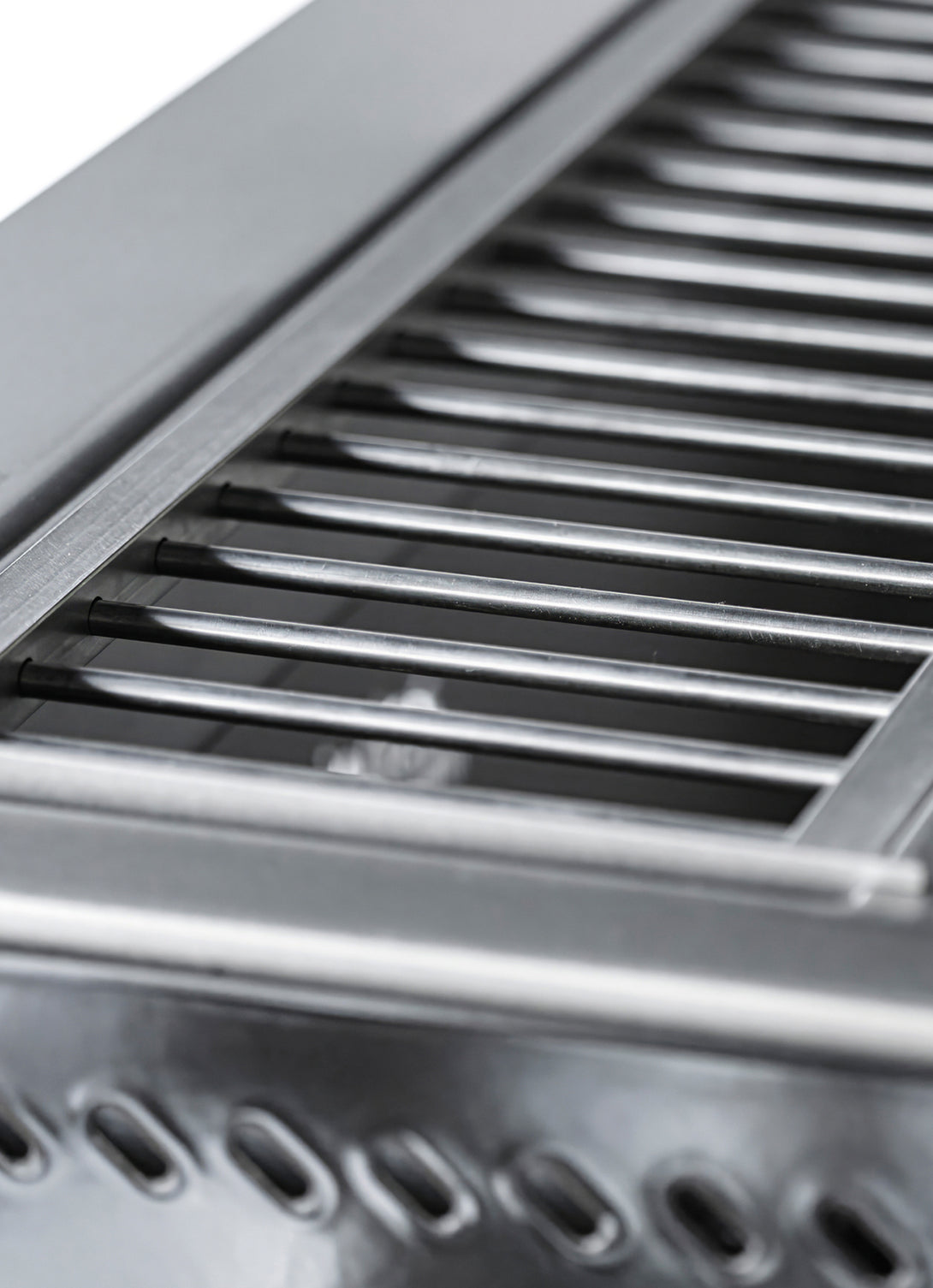 Pálcás grillrács keretes kialakítással, rozsdamentes acél felület a Pujadas Open Grillben
